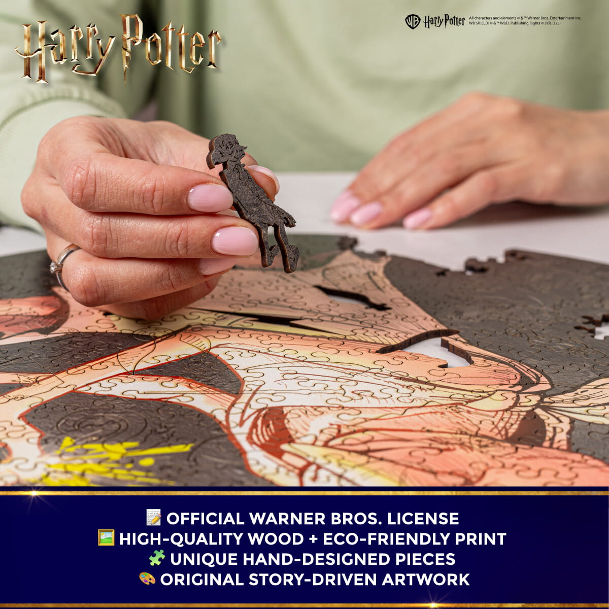 Person assembling a wooden puzzle with Harry Potter branding