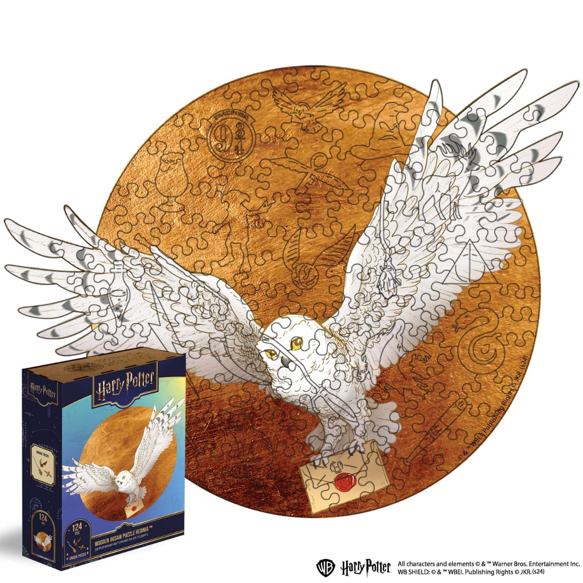 Jigsaw puzzle with an owl design and packaging on a white background