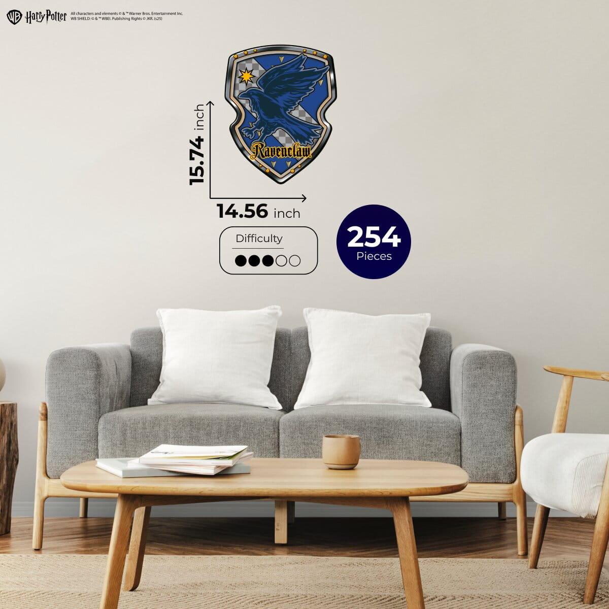 Living room with a gray sofa, wooden coffee table, and decorative wall emblem.