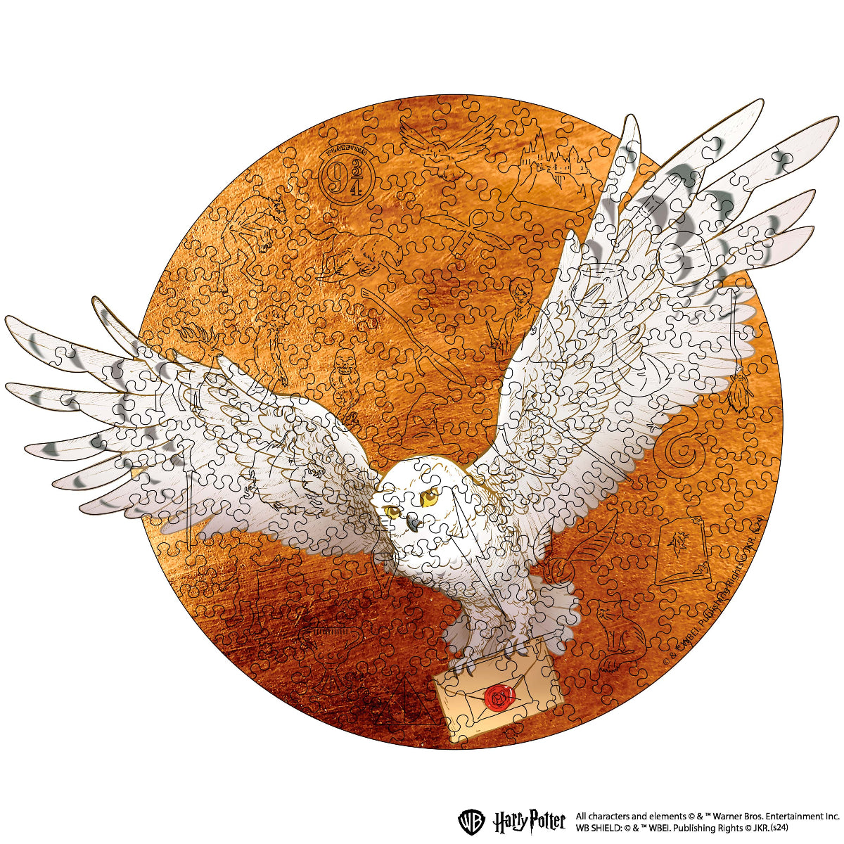 Jigsaw puzzle with a snowy owl and envelope on an orange background, featuring Harry Potter branding.