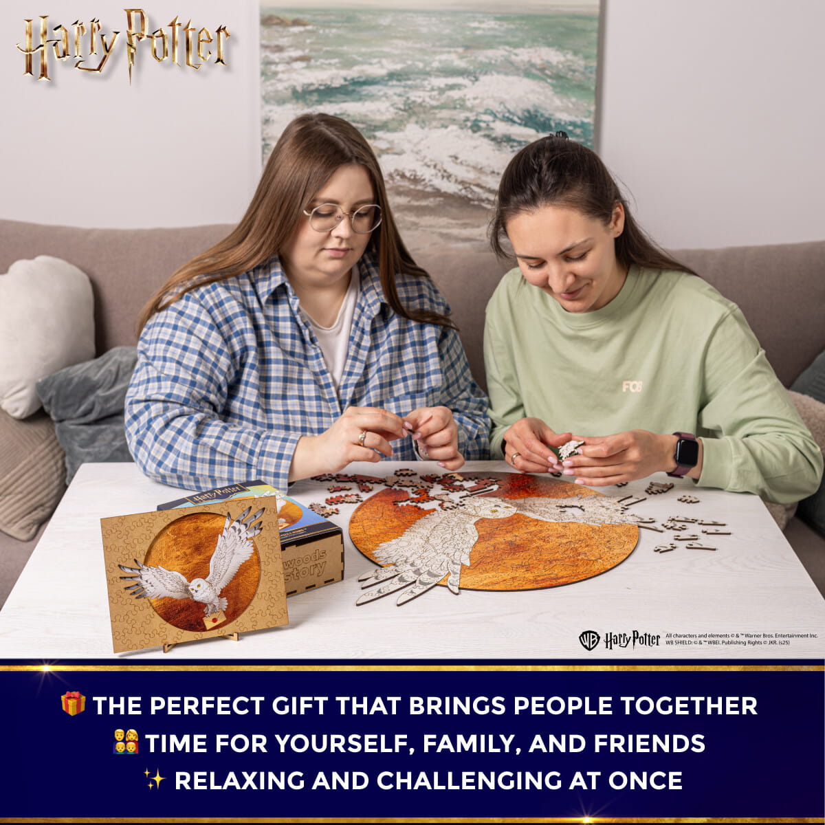 Two people working on a puzzle together with 'Harry Potter' branding.