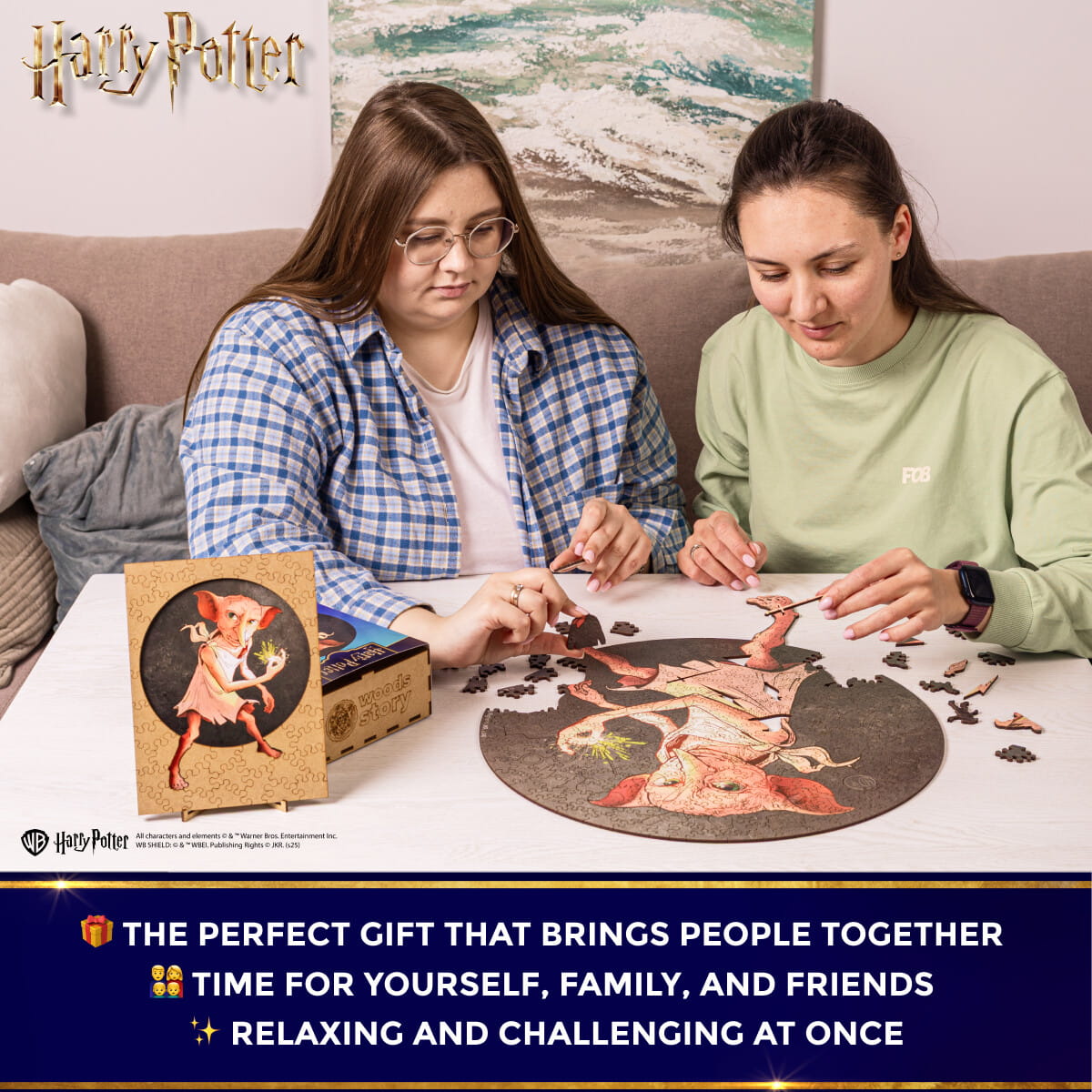 Two people working on a puzzle together with 'Harry Potter' branding.