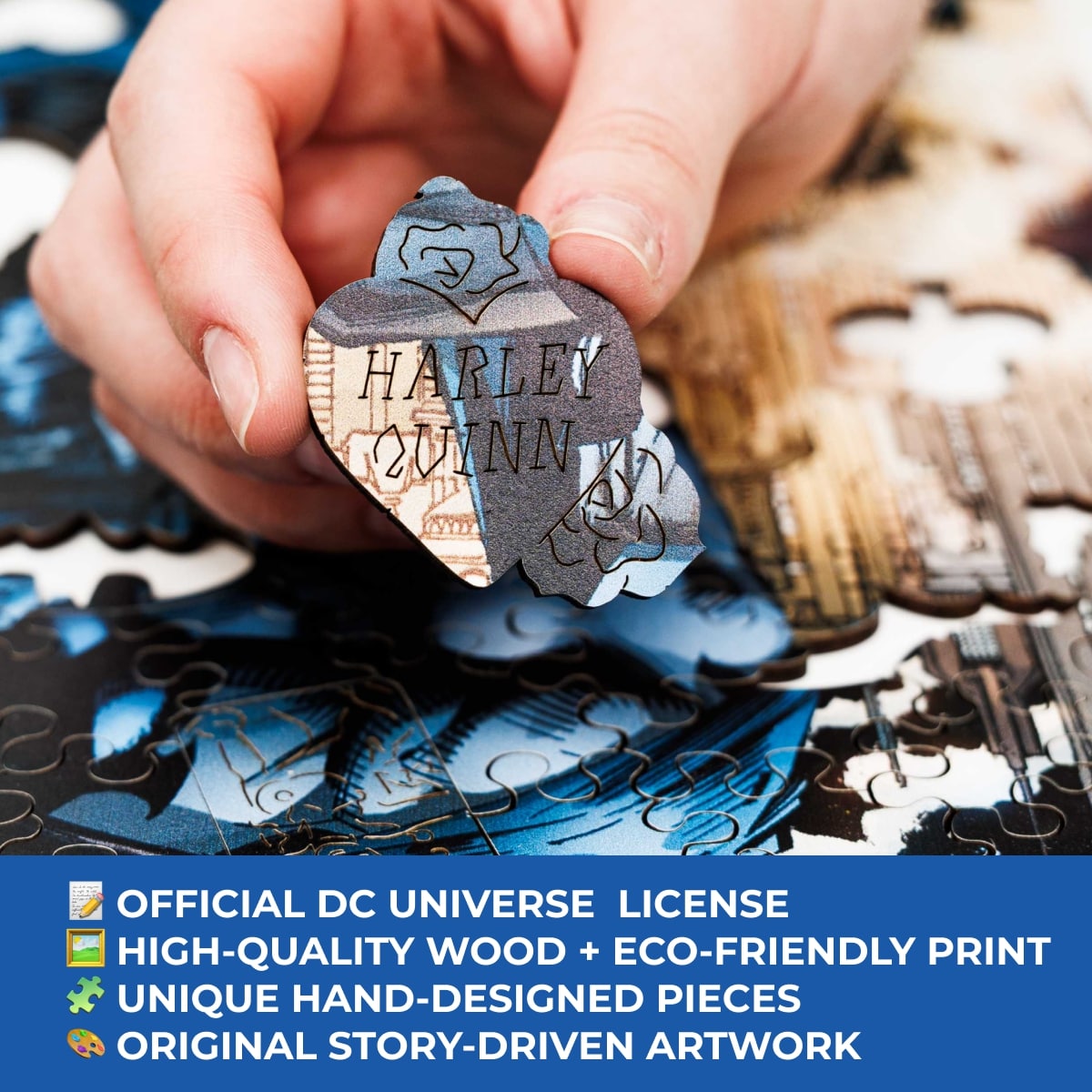 Hand holding a puzzle piece with 'Harley Quinn' design, surrounded by a partially completed puzzle.