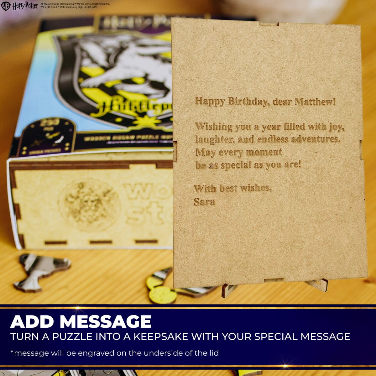 Personalized birthday card with engraved message in front of a Hufflepuff-themed puzzle box