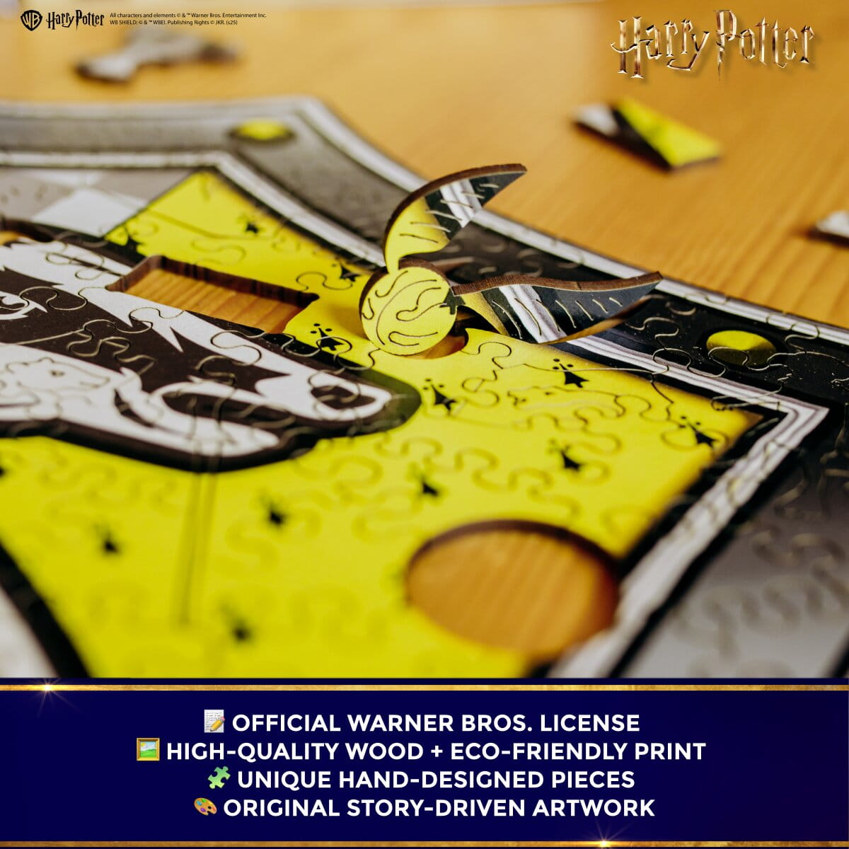 Close-up of a Harry Potter-themed puzzle with a yellow and black design, featuring the Warner Bros. license.